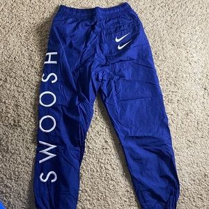 Mens swoosh windbreaker pants